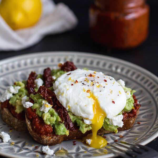 Harissa-Smashed-Avocado-Egg-Toast-with-Goat-Cheese-and-Honey-Drizzle